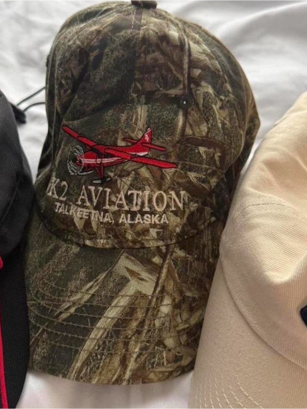 K2 Aviation Talkeetna Alaska Camouflage Hat with Red Plane Embroidery